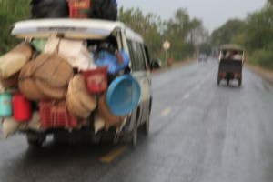 this is a terrible photo, but gives you the idea of how every bit of space in a car, van, truck or motorbike is used to its full capacity!